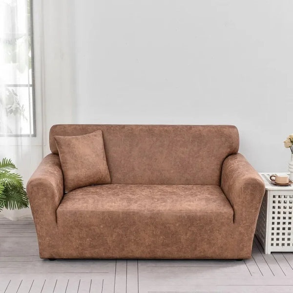 A brown PU leather sofa slipcover placed in a bright living room setting.