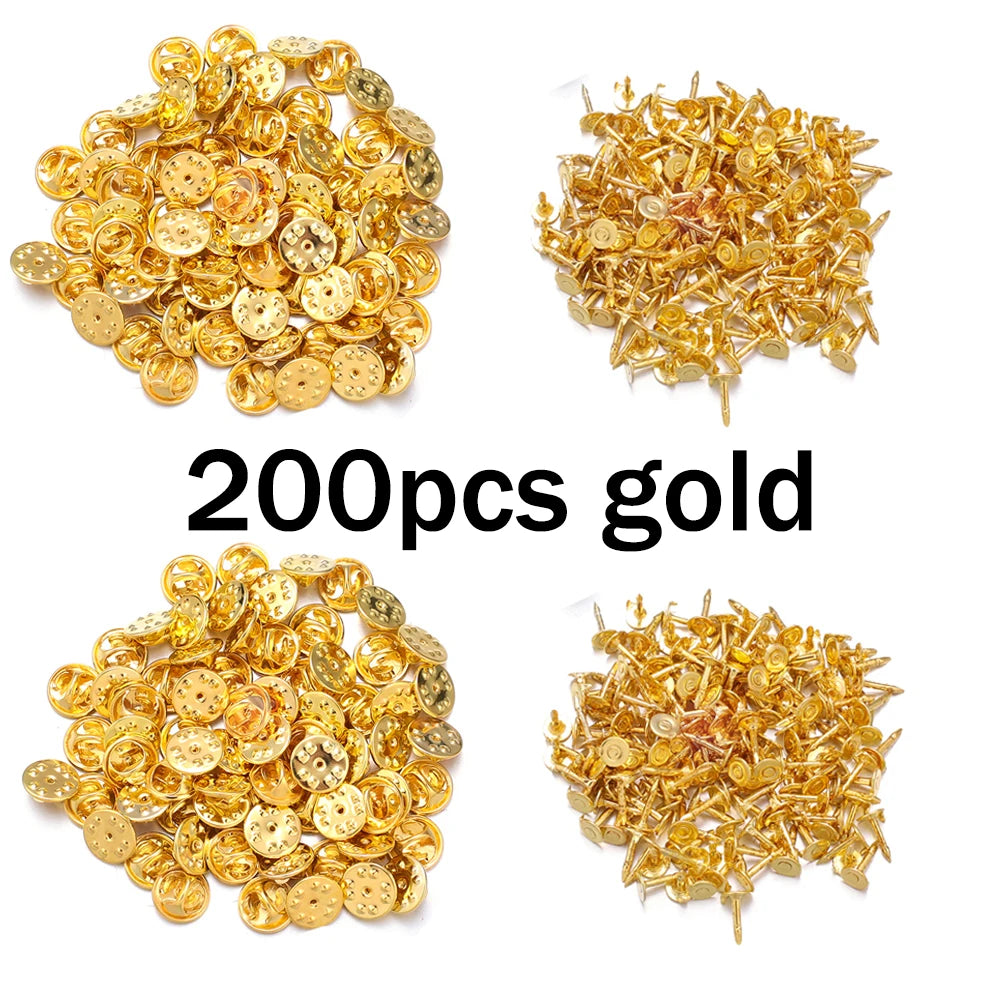 A collection of 200 gold metal pin findings including clasps and tie tacks for jewelry making.