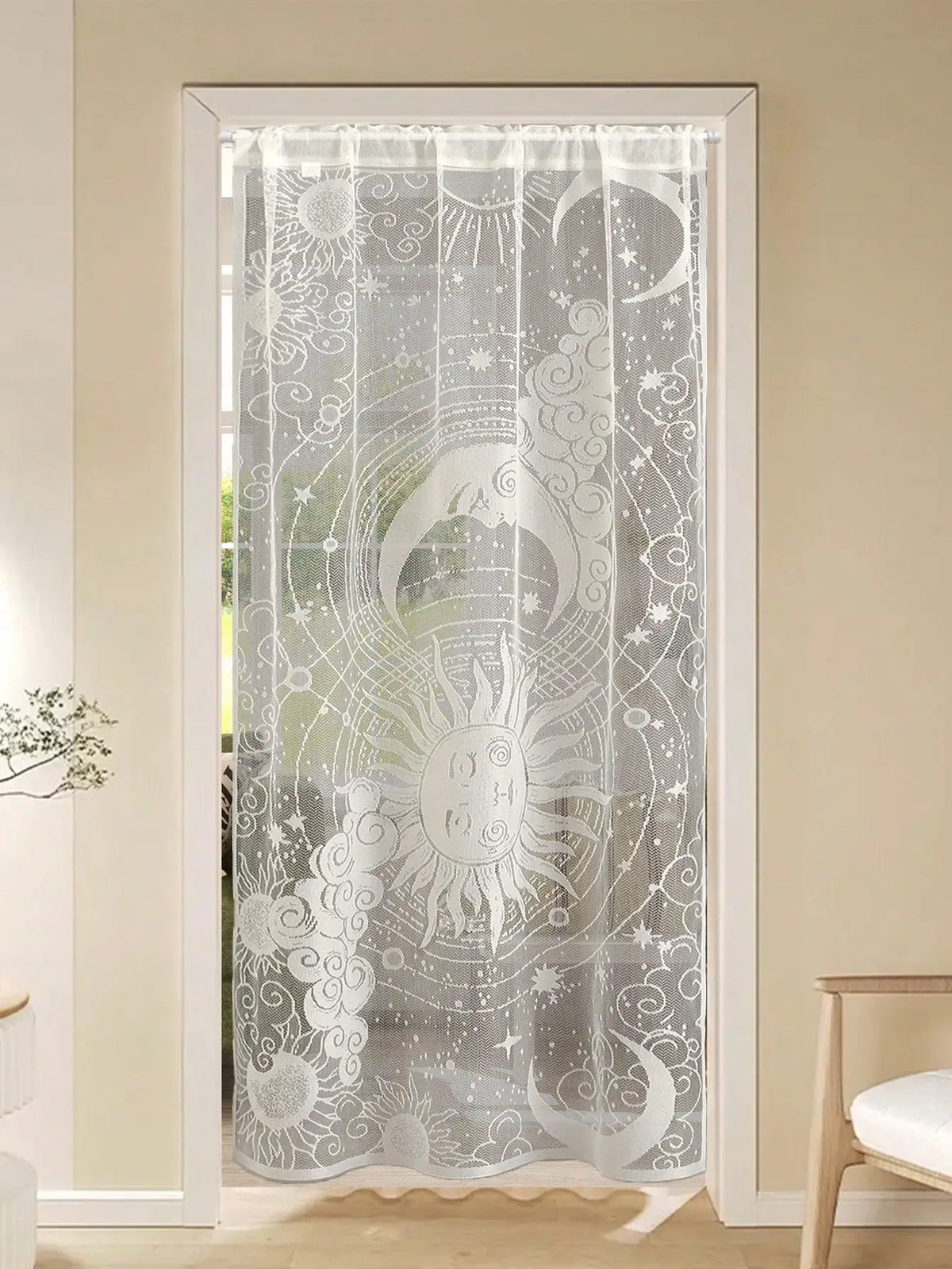 Translucent lace door curtain featuring a celestial design of the sun and moon.