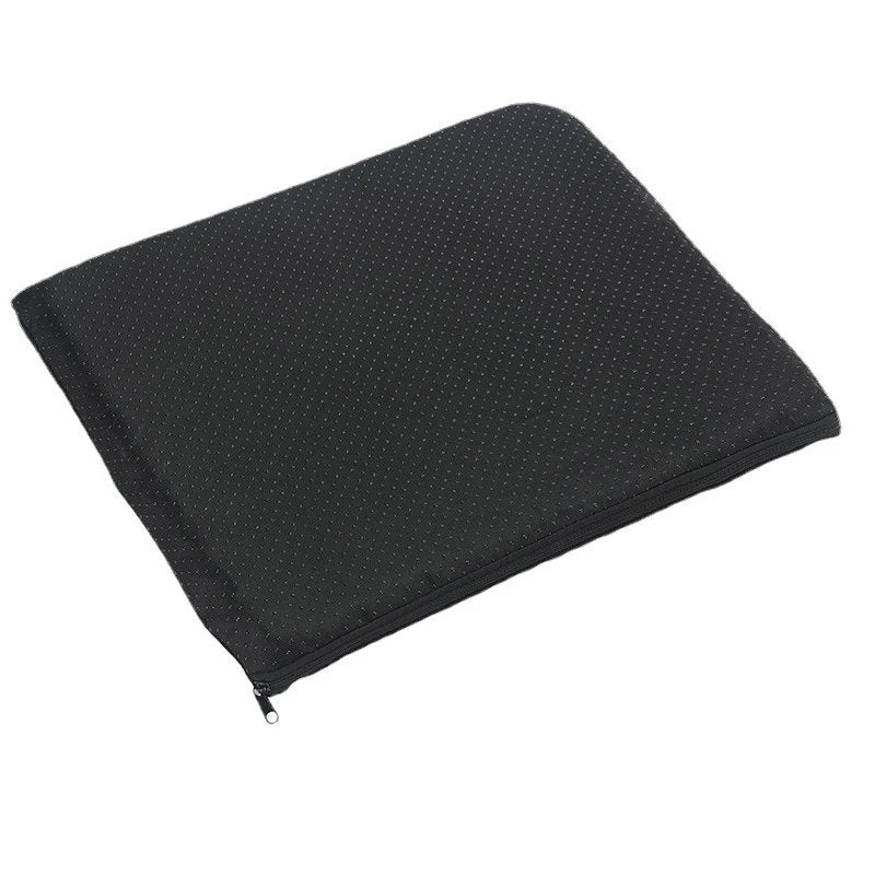 Black ergonomic cooling seat cushion with a textured surface.