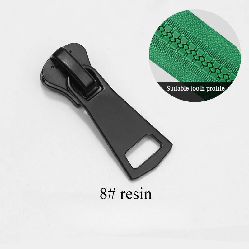 A black resin zipper slider with a suitable tooth profile shown next to the product.