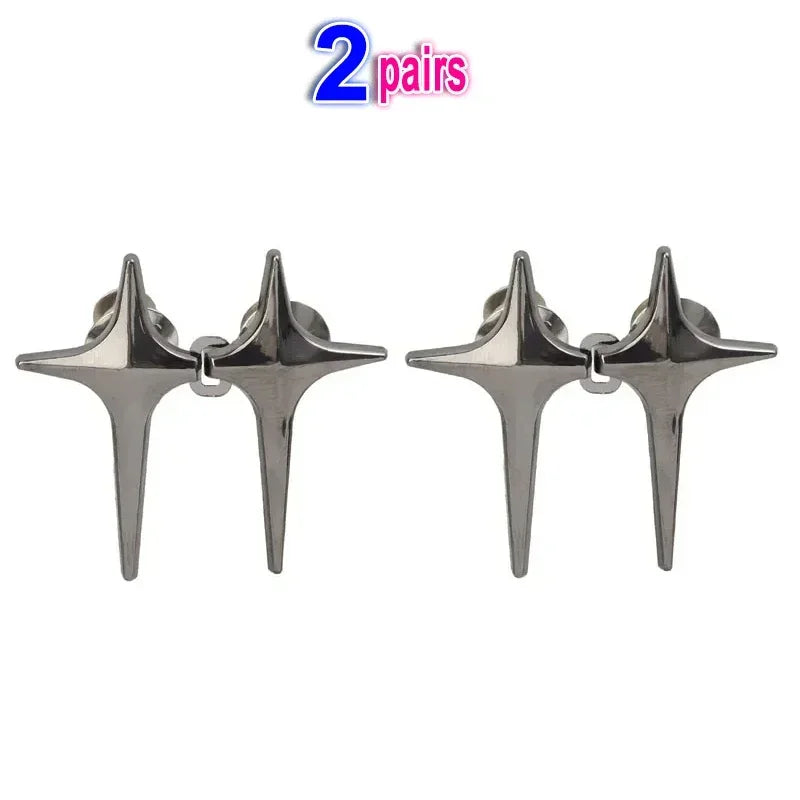 A pair of silver Y2K star clips for jeans and skirts.