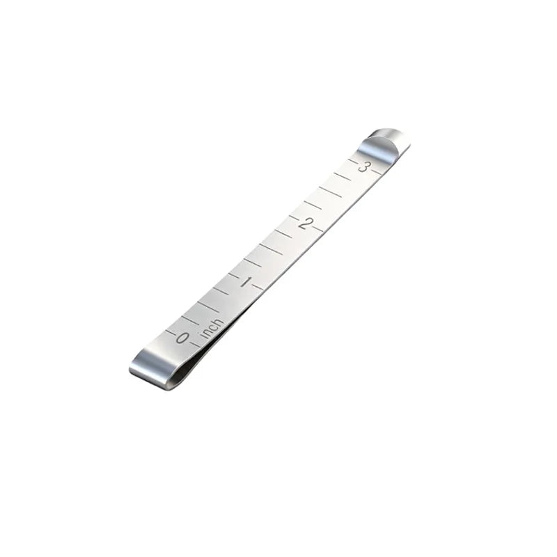 A stainless steel measuring ruler showing inch markings.