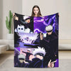 A blanket featuring characters from Jujutsu Kaisen including Gojo Satoru and other sorcerers in purple and black tones.