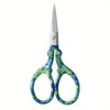 Pair of premium stainless steel embroidery scissors with blue and green floral pattern handles