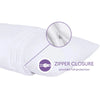 Close-up view of a white waterproof zippered pillow protector showing the zipper closure mechanism.