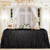 Black sequin glitter tablecloth set for weddings and parties displayed in a formal setting.