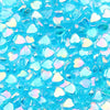 A close-up of a 100-pack of iridescent blue acrylic heart beads for jewelry making.