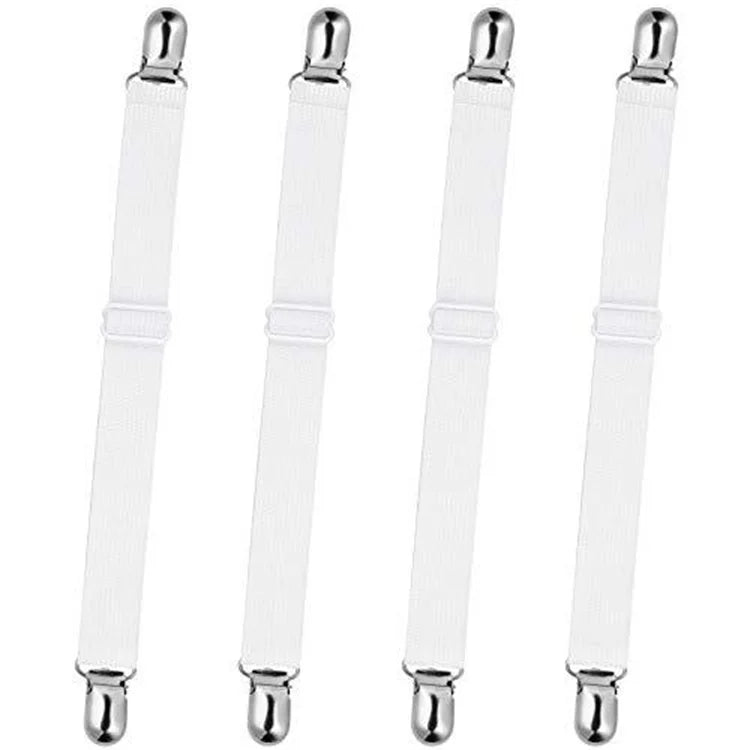 Four clear adjustable bed sheet corner straps with metal tips