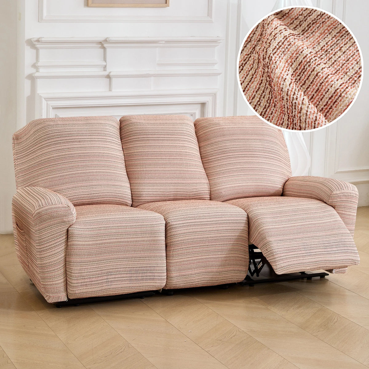 A beige chenille recliner sofa slipcover in a pinkish tone shown in a living room setting.