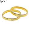 Two gold metal sleeve garters or adjustable arm bands for men