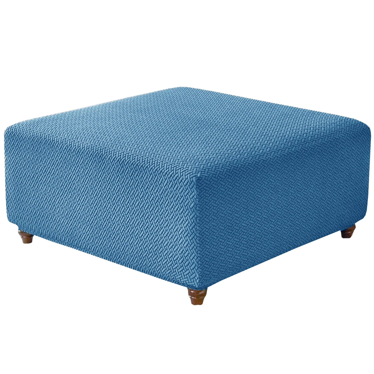 A rectangular ottoman cover in a textured blue stretch jacquard fabric.