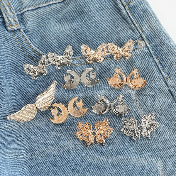 Silver and gold butterfly buttons and adjusters for fastening pants and skirts