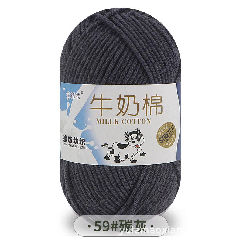 A skein of dark gray milk cotton yarn labeled with Chinese and English text.