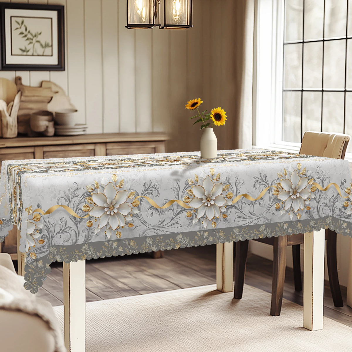 Elegant floral tablecloth with embossed edges displayed on a wooden table.