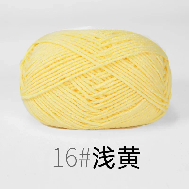 A ball of bright yellow 16# cotton knitting yarn for crafts.
