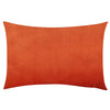 A square, burnt orange velvet throw pillow cover.