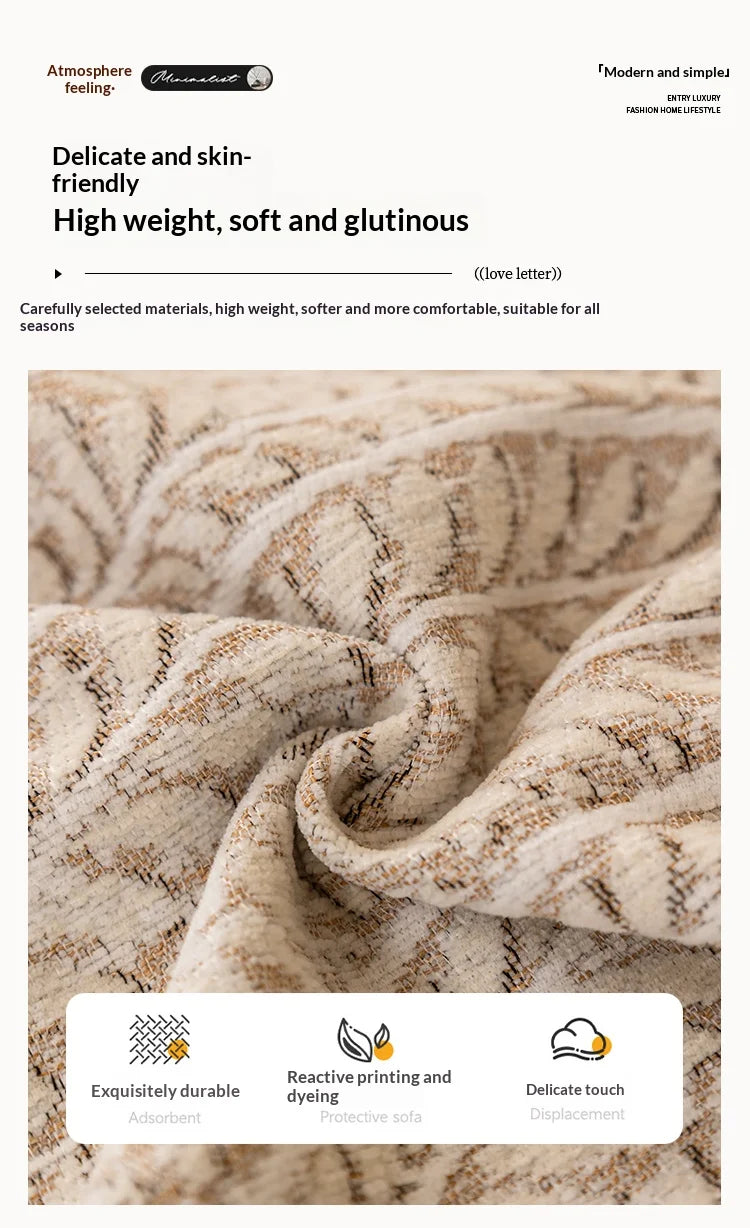 Close-up of a beige and brown herringbone textured fabric used for a sofa cover.