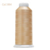 Spool of gold colored high tenacity machine embroidery thread