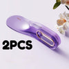 Two purple silicone mattress lifters or bed linen organizers shown on a white background.