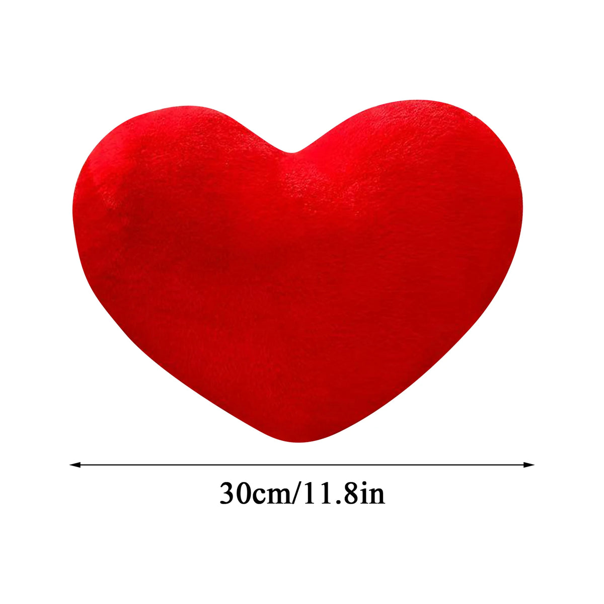 A vibrant red heart-shaped throw pillow.