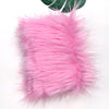 Pink faux fur plush fabric used for sewing and crafting