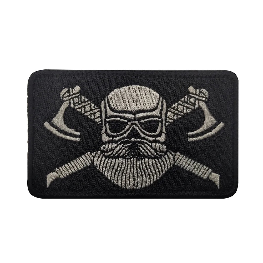 Black embroidered Valknut Viking patch featuring a bearded face with horns and hook and loop backing