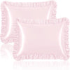A set of two ruffled satin pillowcases in a light pink color with silky envelope closures.