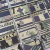 A grid of tactical multicam national flag patches featuring various country flags.
