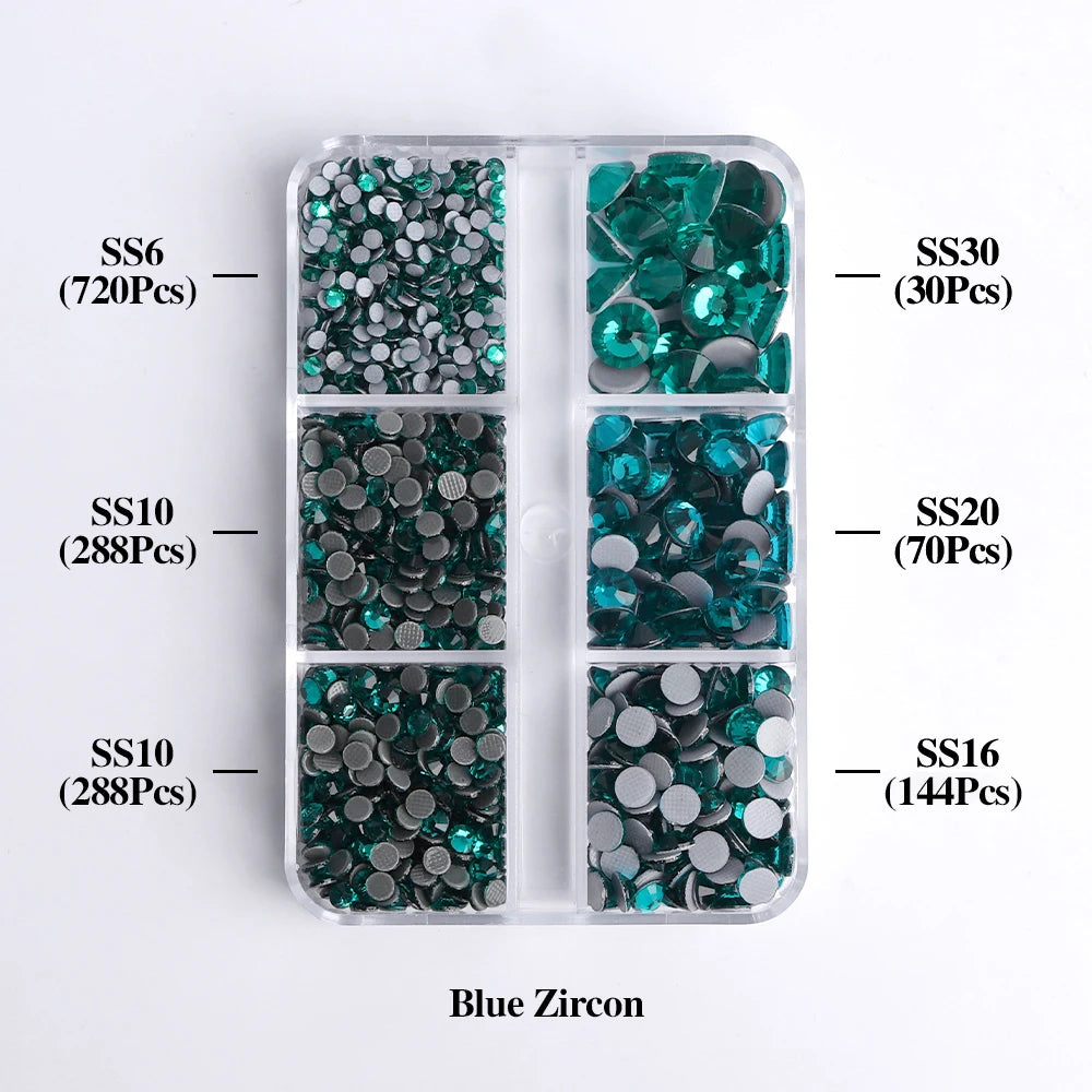 A clear plastic tray containing various sizes of blue zircon glass rhinestones categorized by SS6, SS10, SS20, and SS30.