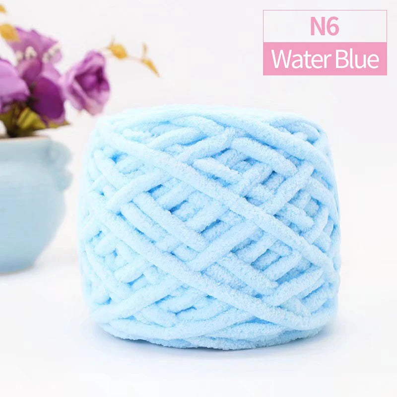 A ball of light blue N6 water blue chunky velvet knitting yarn for home decor.