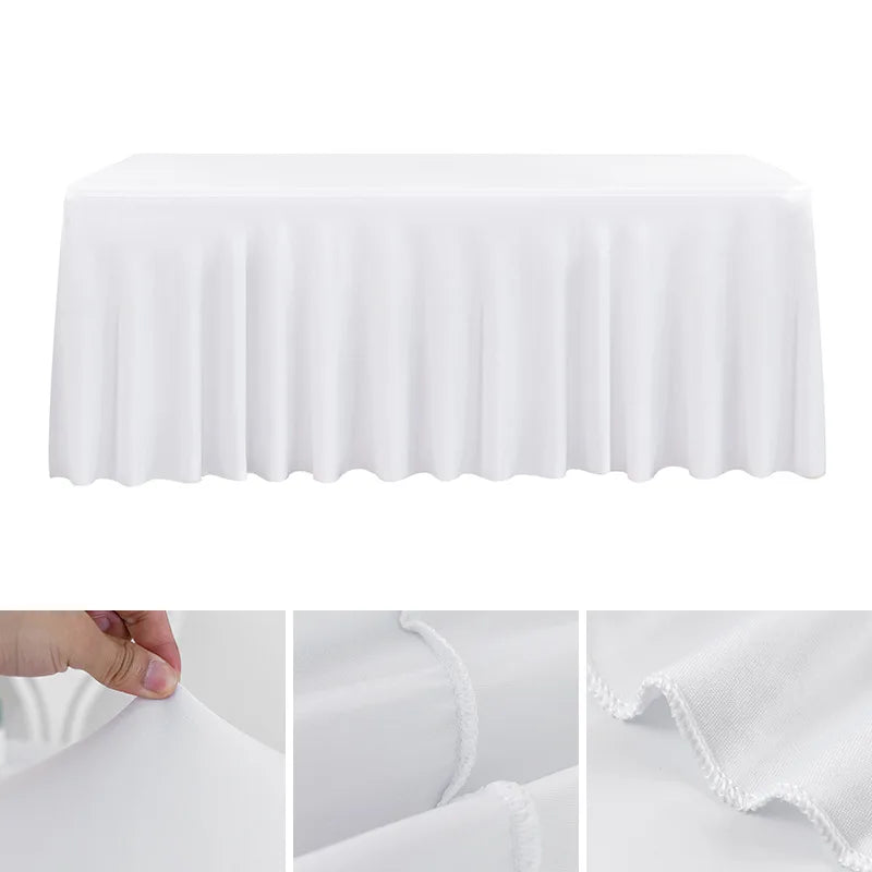 White stretchable waterproof rectangle tablecloth draped on a table.