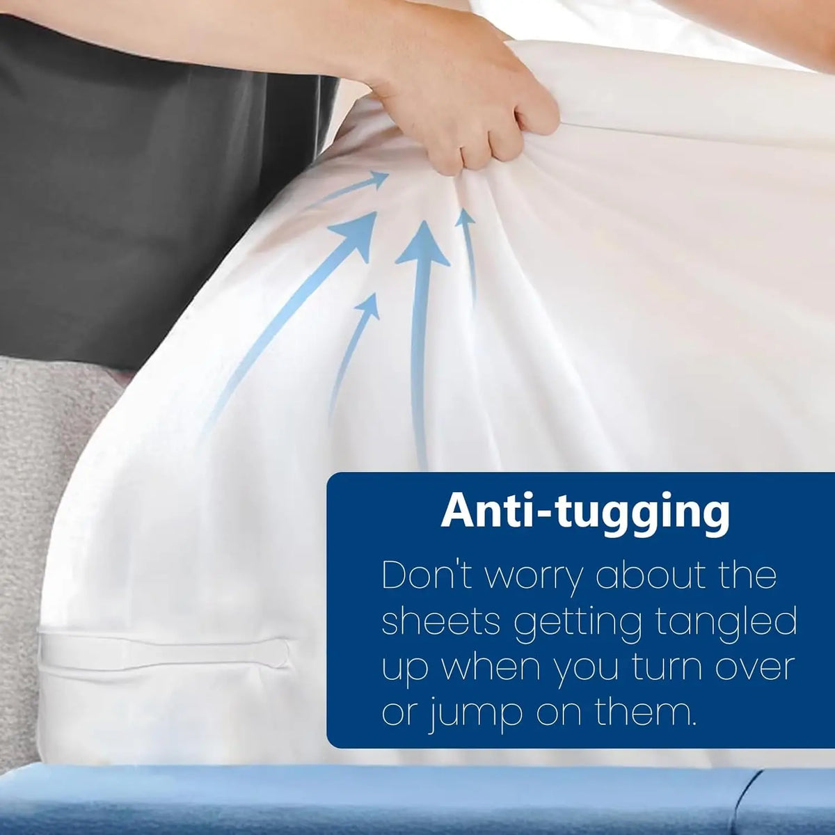 A hand is adjusting a white bedsheet with anti-tugging clips to prevent tangling.