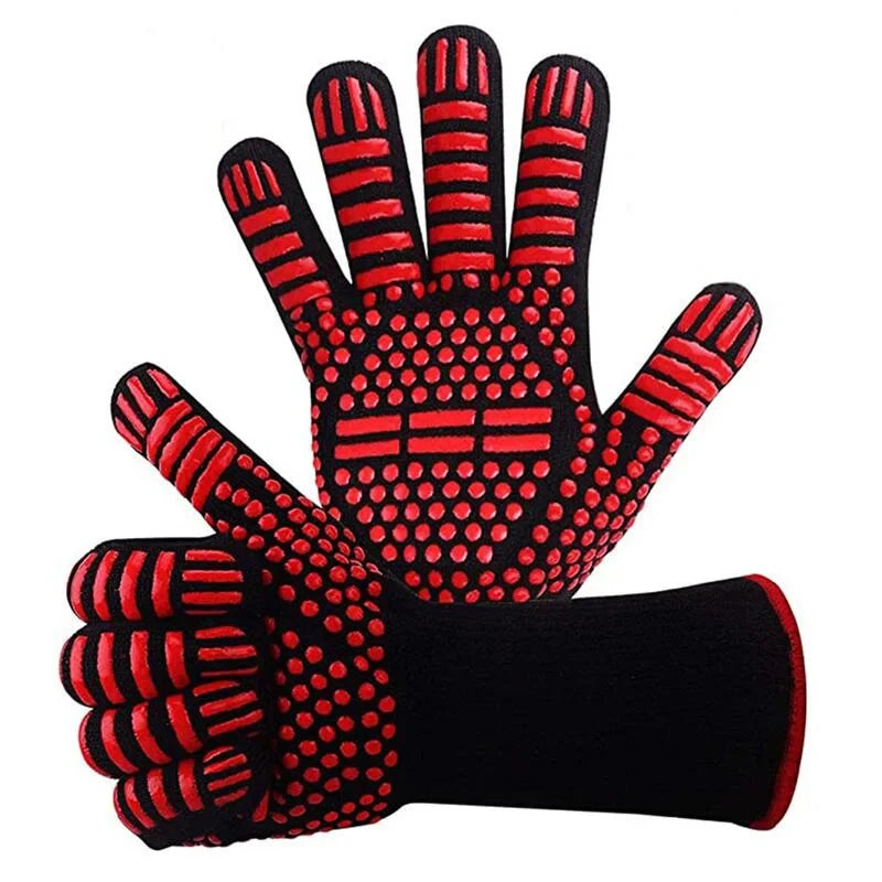 A pair of black and red heat resistant BBQ gloves with a non-slip silicone grip.