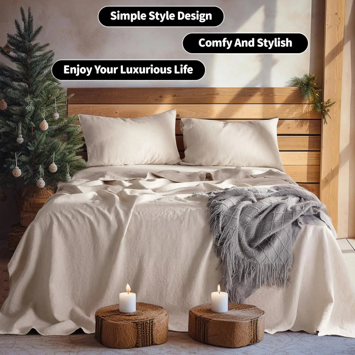 A bedroom scene featuring a bed with white linen bedding, pillows, and a gray throw blanket, next to a Christmas tree.