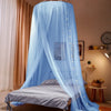 Light blue sheer mosquito net canopy draped over a bed, providing a protective enclosure.