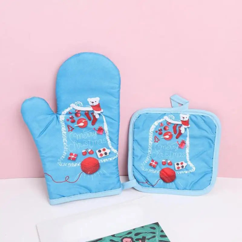 Blue insulated oven mitts featuring a festive Christmas design with Santa and a snowman.