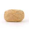 A ball of tan matte chenille yarn used for knitting and crochet
