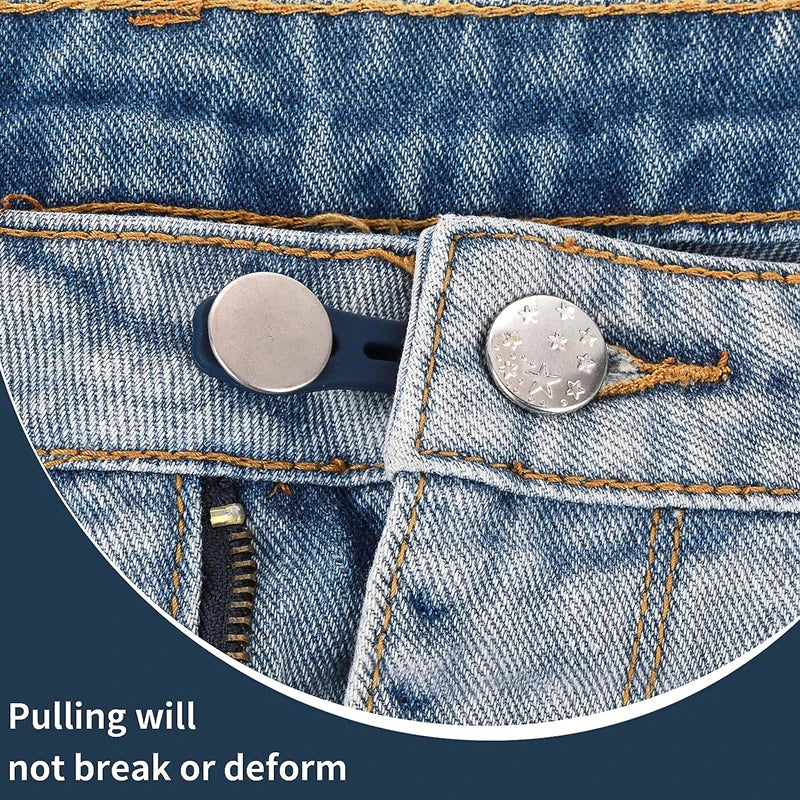 Close-up of a metal button extender for jeans showing how it prevents tearing or deformation.
