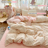 A pink and cream polka dot duvet cover set includes three counts of pillowcases, a duvet cover, and two pillowcases.