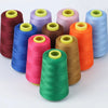 A collection of colorful sewing thread spools in various shades including red, purple, blue, green, and orange.