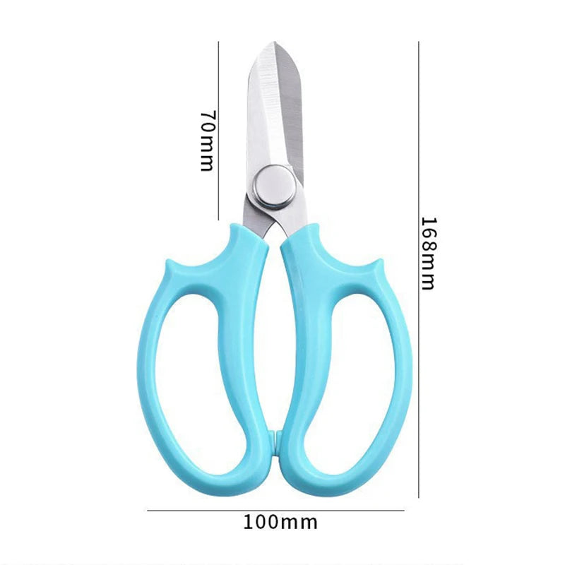 A pair of light blue precision shears with comfort grips shown against a white background.