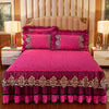 A vibrant pink quilted bed skirt set featuring a magenta comforter and matching pillows.