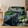 A realistic illustration of a dinosaur head in a dark green jungle setting on a blanket.