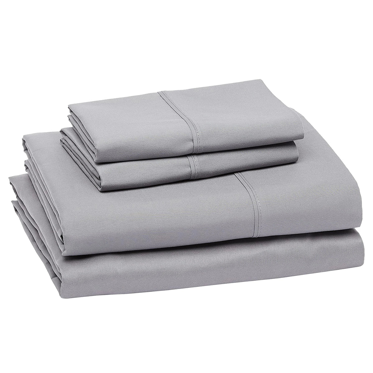 A stack of four gray microfiber flat fitted sheets folded neatly.