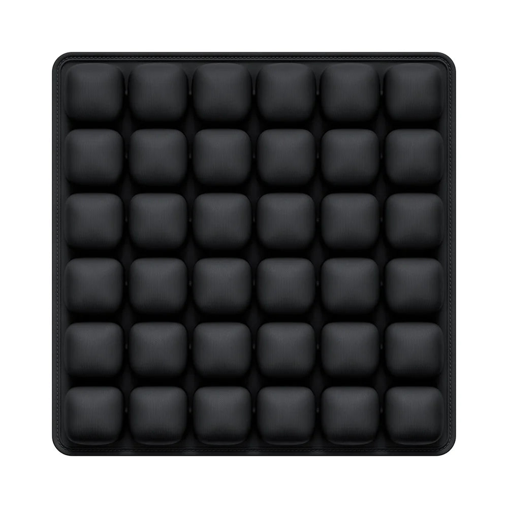 Black adjustable press-to-inflate seat cushion with individual air cells.