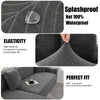 Close-up view of a gray jacquard sofa cushion cover demonstrating elasticity and fit.