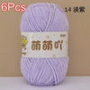 A skein of light purple soft bulky chenille yarn is shown, packaged for crochet and knitting projects.