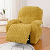 A mustard yellow double-sided jacquard sofa cover set displayed on a wooden floor.