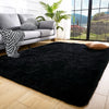 A luxurious black velvet anti-slip floor mat placed on a light wood floor in a modern living room.